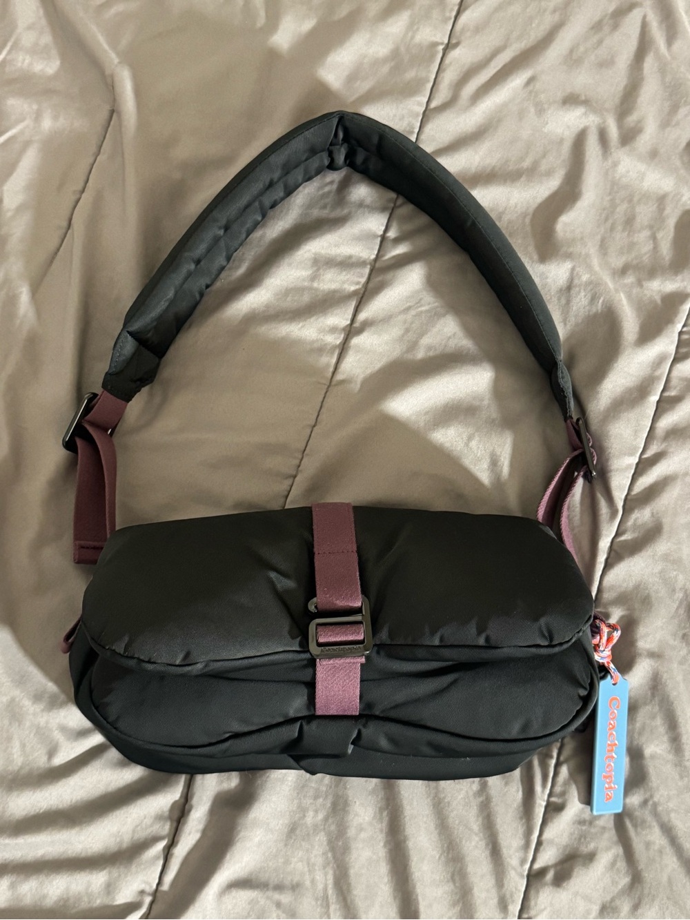 Black Quilted Shoulder Bag with Plum Strap Accent